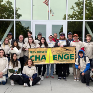 Group of Teenagers Holding Certificates and Smiling