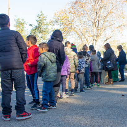 Children Waiting in Line for Bikes