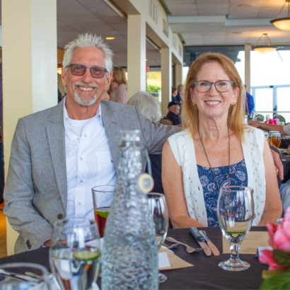 SAF Members Seated at Dinner Table During Annual Event