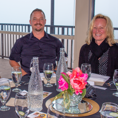 SAF Members Seated at Dinner Table During Annual Event