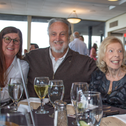 SAF Members Seated at Dinner Table During Annual Event