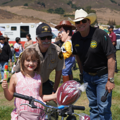 Young Girl Who Won Bike Raffle at Family Day Event