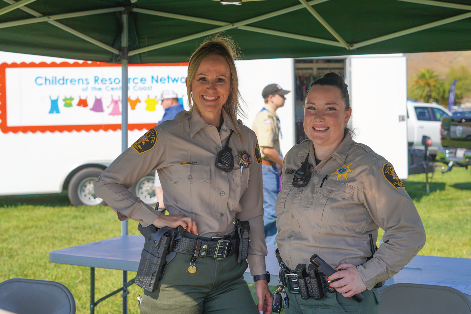 Female Sheriff Deputies Smiling