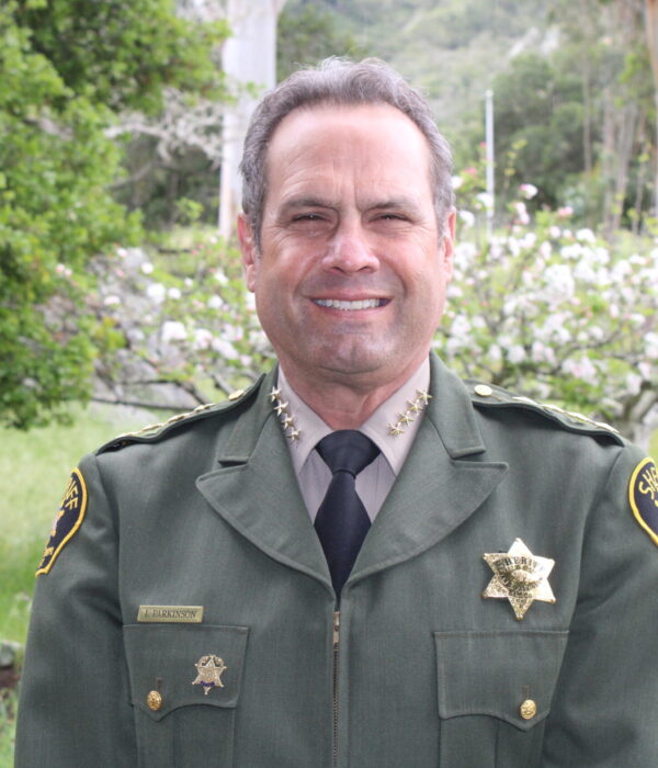 Sheriff Ian Parkinson with Spring Meadow in Background