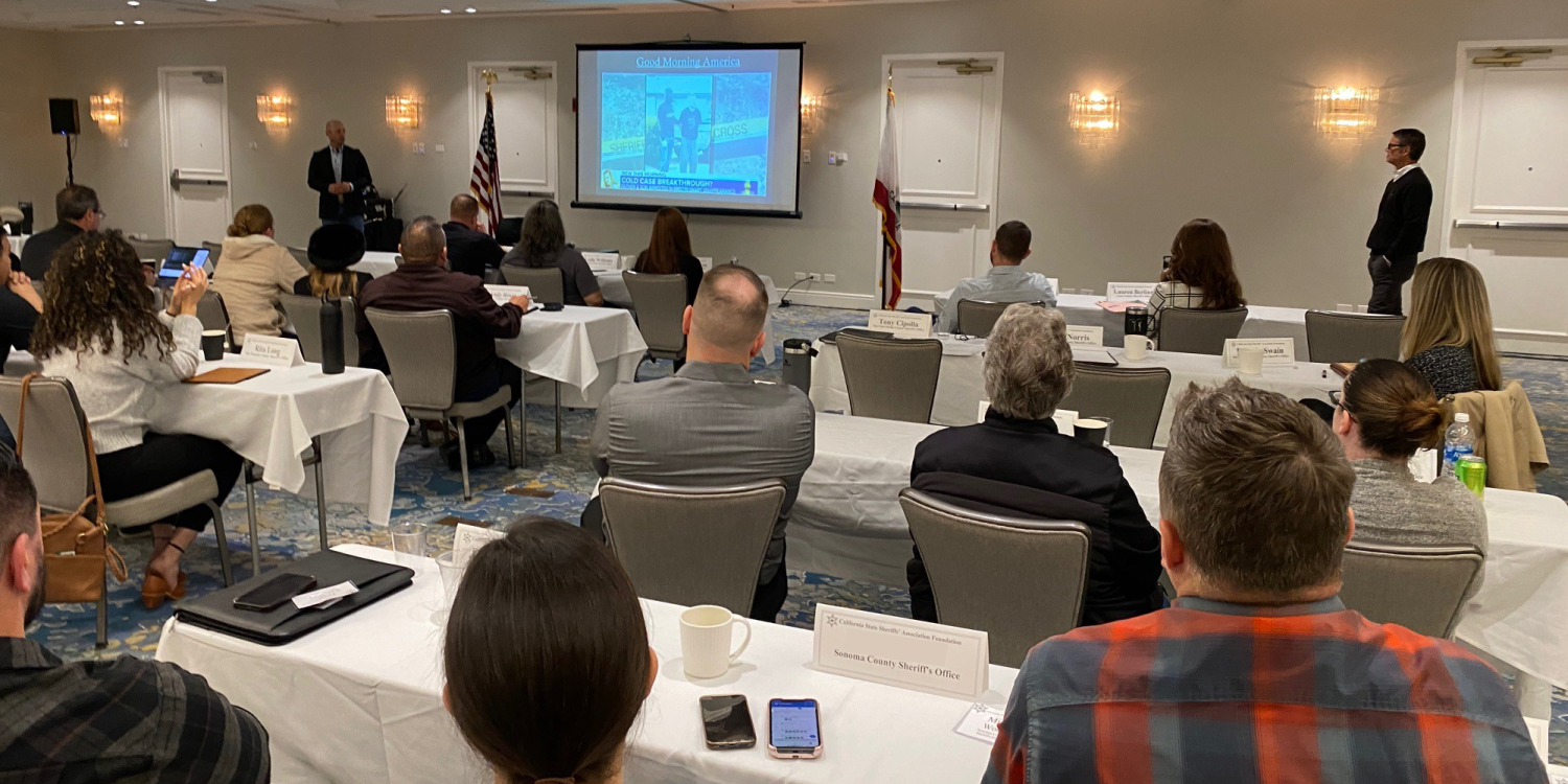 Citizens Seated in Conference Room Viewing Presentation