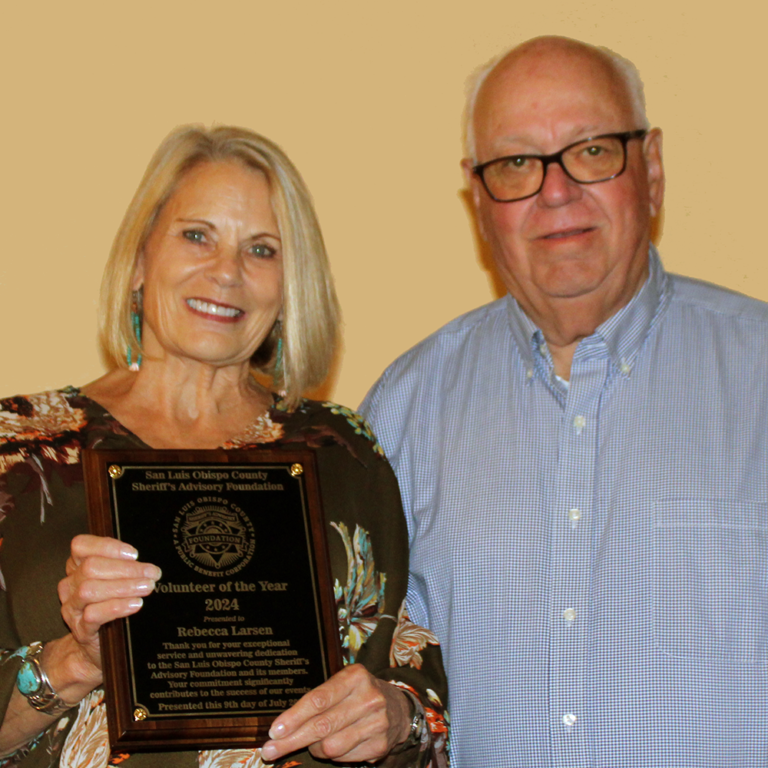 Volunteer of the Year 2024 Rebecca Larsen Accepting Award