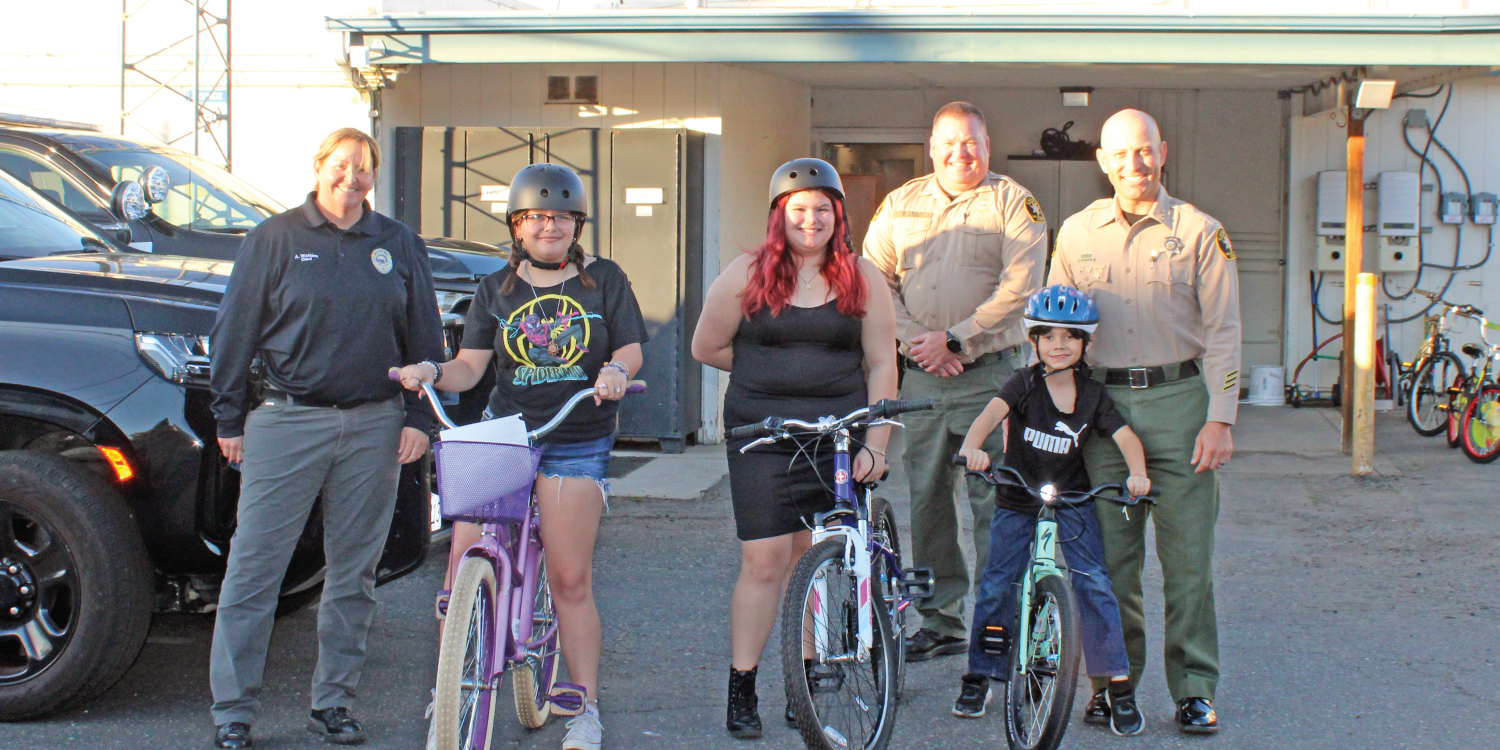 Morro Bay PD and SLO Sherriff Giving out Bikes to Children